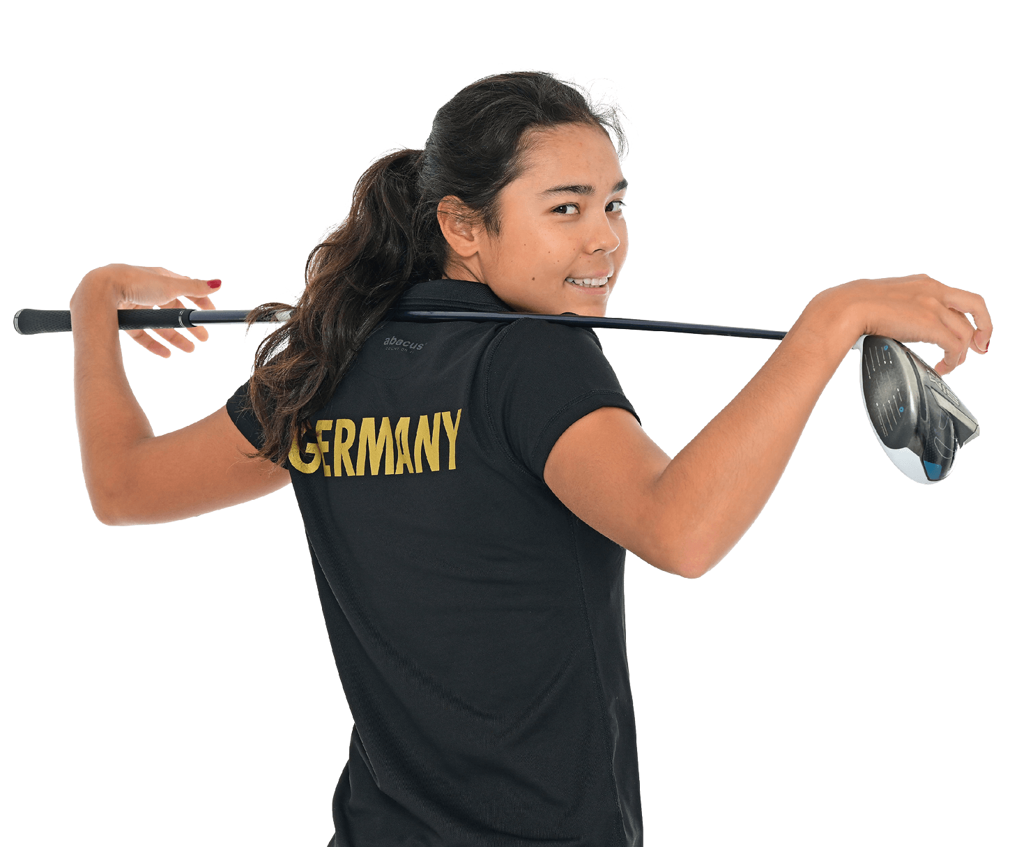 Golferin Susanna Brenske im Deutschland-Polo mit Golfschläger über den Schultern, Blick über die Schulter